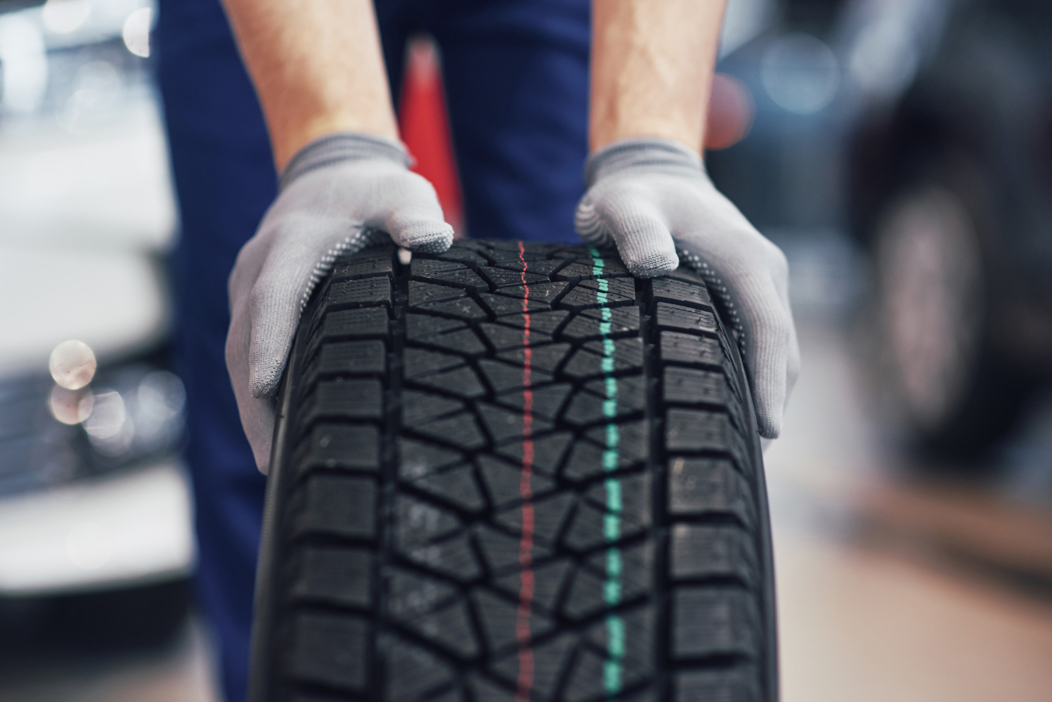 Man with tyre in his hands
