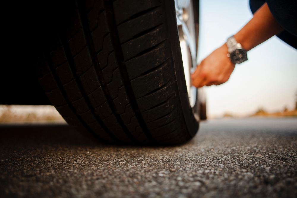 Tyres and a hand